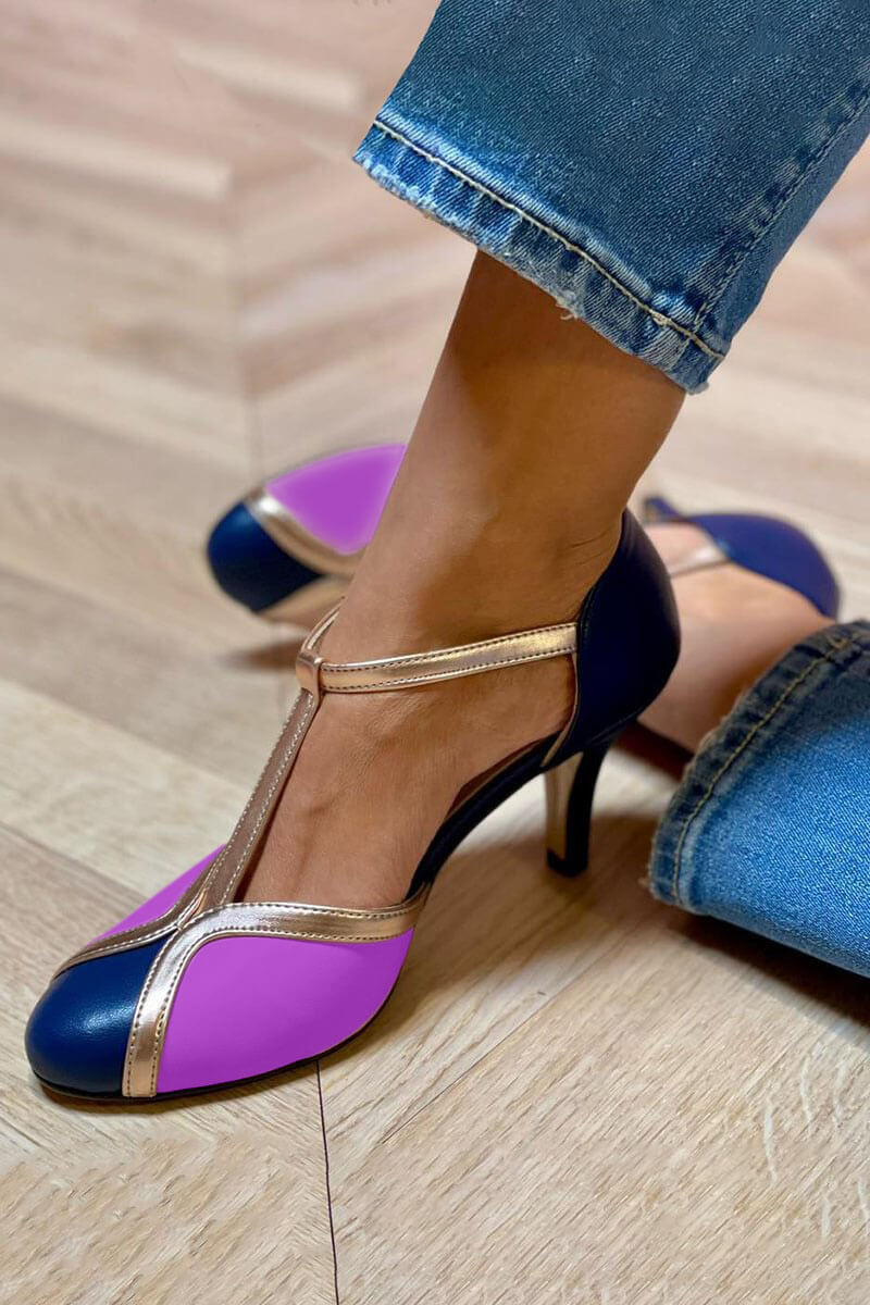 Farbblock-Stiletto-Absätze mit geschlossener runder Zehenpartie und T-Riemen"
could be rewritten as:
"Farbblock-Stiletto-Pumps mit runder Zehenpartie und T-Riemen