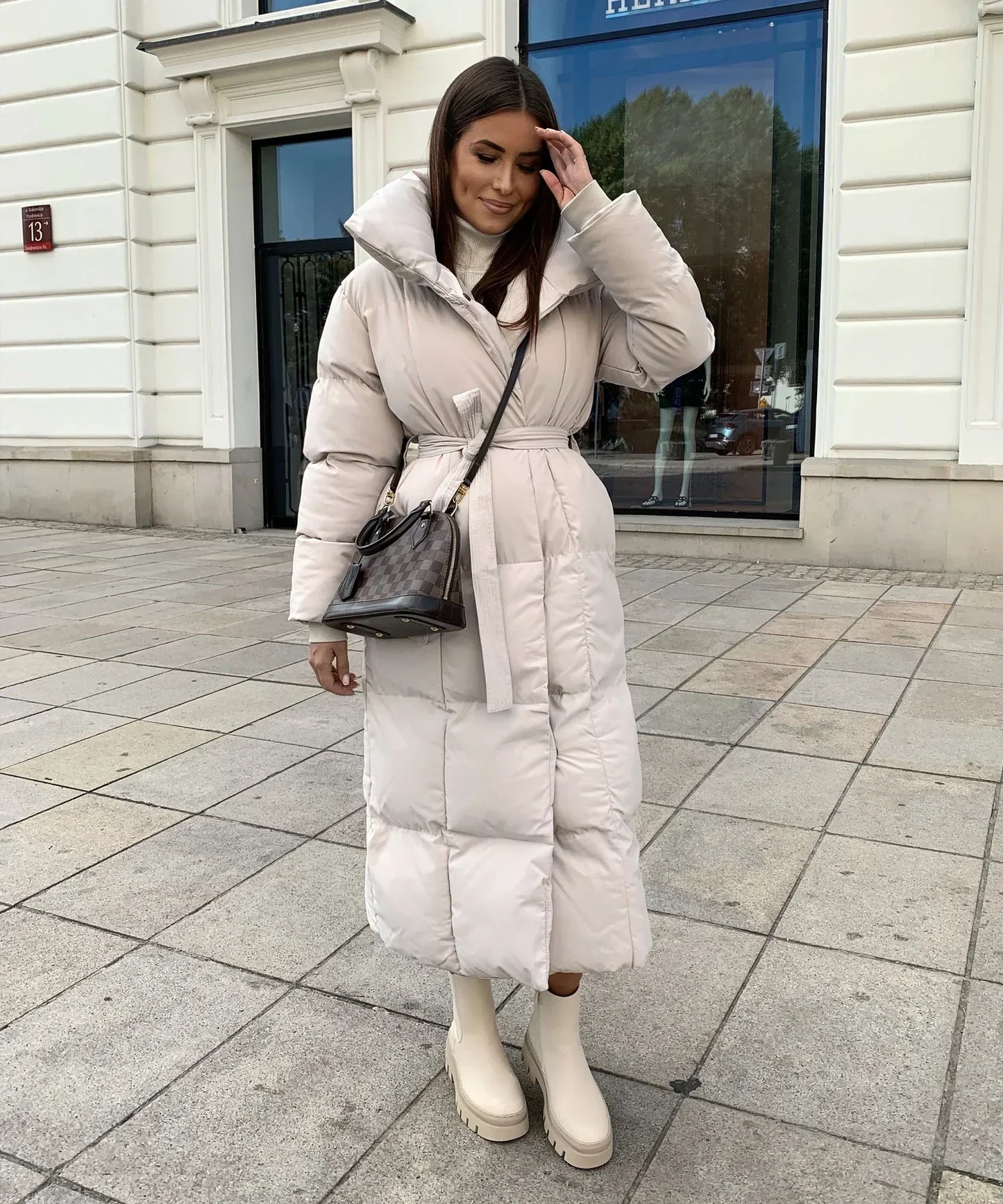 Mia | Elegante lange Pufferjacke mit Taillengürtel