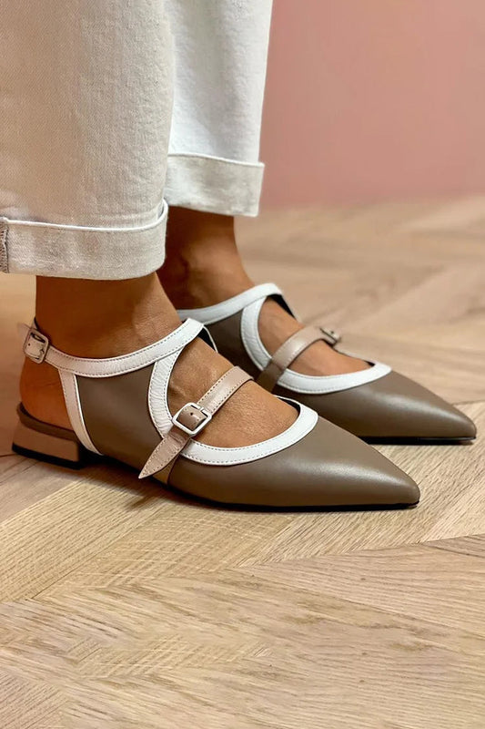 Graue Ballerinas mit auffälligem Spannriemen und spitz zulaufender Zehenpartie