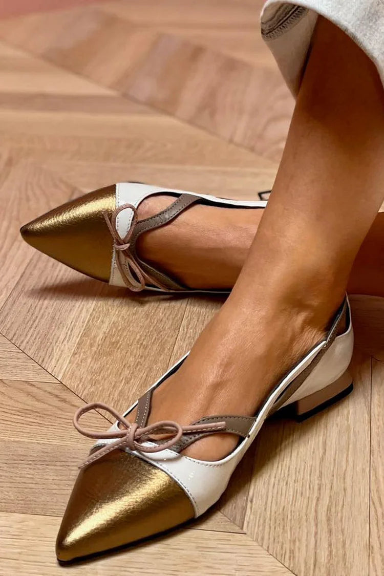 Ballerinas mit spitzen Zehen und farblich akzentuierten Ausschnitten