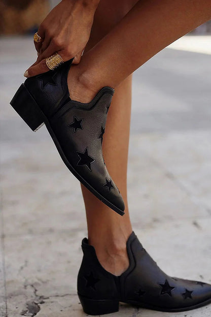 Schwarze Stiefeletten mit spitzem Zehenbereich und Sternen-Design