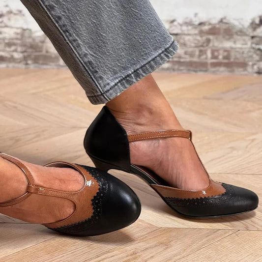Schwarze Patchwork-Stiletto-Absätze mit T-Riemen, Schnalle und runder Zehenpartie